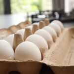 Carton of fresh eggs on a kitchen counter — FDA egg recall salmonella