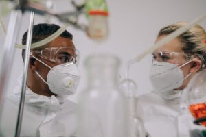 Scientists in protective suits working in a laboratory during the Ebola outbreak in DRC